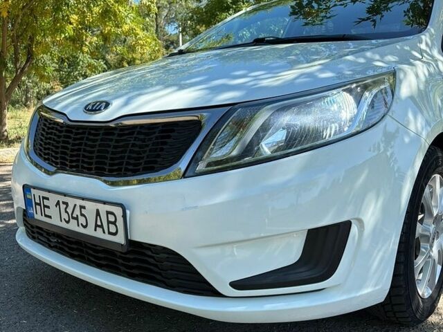 Белый Киа Рио, объемом двигателя 1.4 л и пробегом 131 тыс. км за 8499 $, фото 1 на Automoto.ua