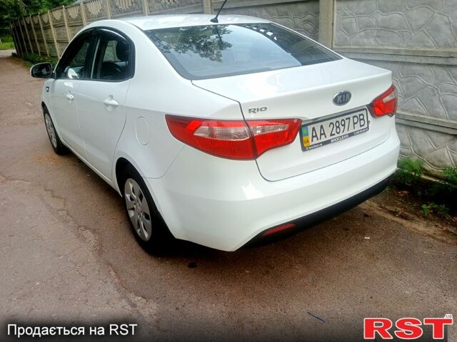 Білий Кіа Ріо, об'ємом двигуна 1.4 л та пробігом 81 тис. км за 8999 $, фото 4 на Automoto.ua