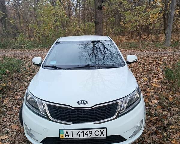 Белый Киа Рио, объемом двигателя 1.59 л и пробегом 208 тыс. км за 6500 $, фото 1 на Automoto.ua