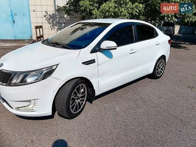 Білий Кіа Ріо, об'ємом двигуна 1.6 л та пробігом 202 тис. км за 6500 $, фото 7 на Automoto.ua