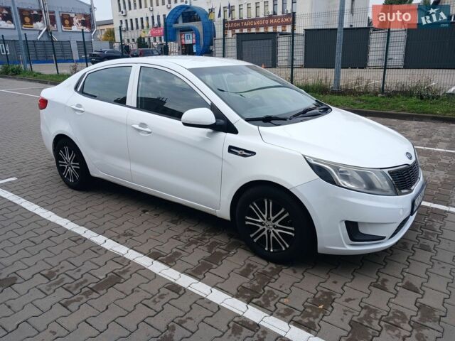 Білий Кіа Ріо, об'ємом двигуна 1.4 л та пробігом 230 тис. км за 5300 $, фото 6 на Automoto.ua