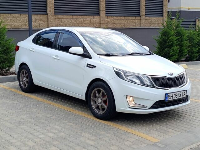 Белый Киа Рио, объемом двигателя 1.4 л и пробегом 99 тыс. км за 6517 $, фото 5 на Automoto.ua