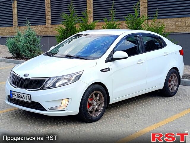 Білий Кіа Ріо, об'ємом двигуна 1.4 л та пробігом 99 тис. км за 6500 $, фото 6 на Automoto.ua