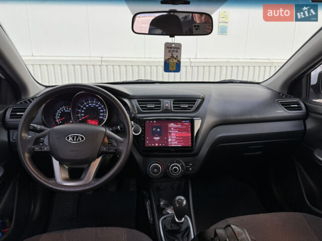 Білий Кіа Ріо, об'ємом двигуна 1.4 л та пробігом 96 тис. км за 8555 $, фото 14 на Automoto.ua
