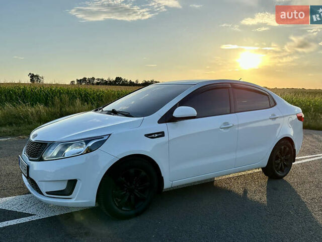 Білий Кіа Ріо, об'ємом двигуна 1.4 л та пробігом 142 тис. км за 6200 $, фото 10 на Automoto.ua