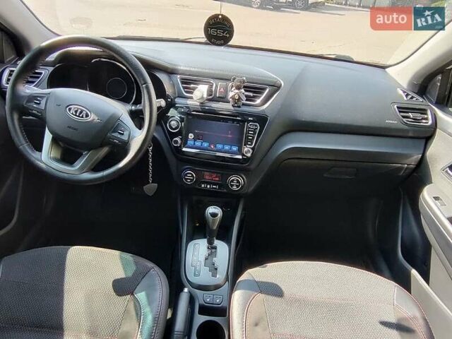 Білий Кіа Ріо, об'ємом двигуна 1.6 л та пробігом 202 тис. км за 6500 $, фото 2 на Automoto.ua