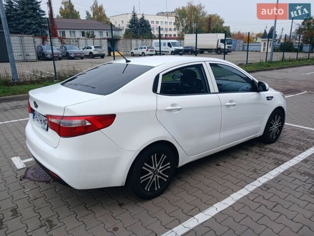 Білий Кіа Ріо, об'ємом двигуна 1.4 л та пробігом 230 тис. км за 5300 $, фото 8 на Automoto.ua