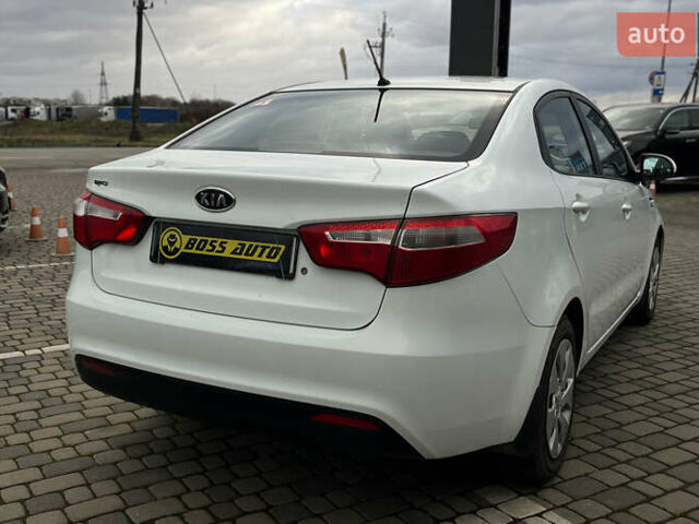 Белый Киа Рио, объемом двигателя 1.4 л и пробегом 200 тыс. км за 6900 $, фото 6 на Automoto.ua