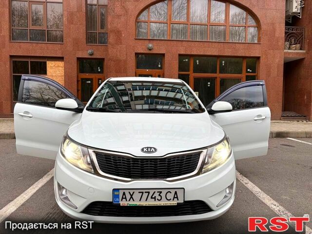 Білий Кіа Ріо, об'ємом двигуна 1.6 л та пробігом 91 тис. км за 8600 $, фото 6 на Automoto.ua
