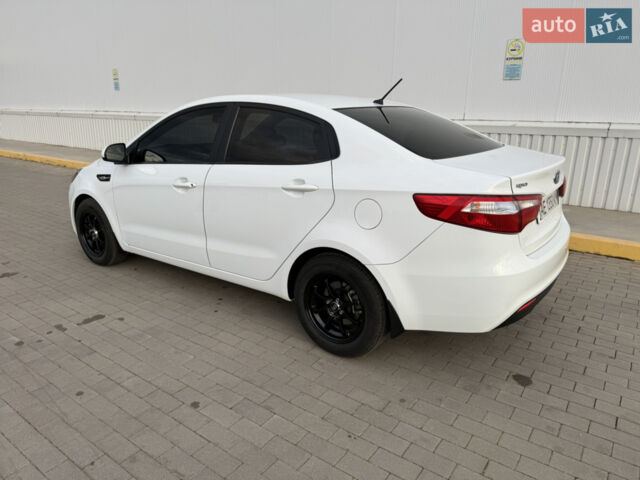 Білий Кіа Ріо, об'ємом двигуна 1.4 л та пробігом 96 тис. км за 8555 $, фото 18 на Automoto.ua