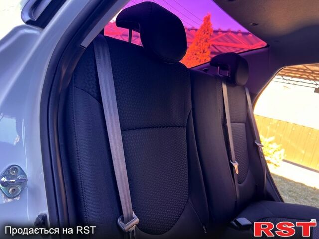Белый Киа Рио, объемом двигателя 1.6 л и пробегом 48 тыс. км за 10200 $, фото 11 на Automoto.ua