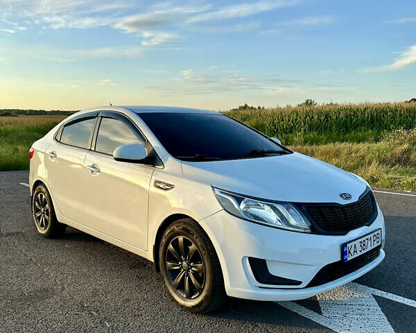 Білий Кіа Ріо, об'ємом двигуна 1.4 л та пробігом 142 тис. км за 6200 $, фото 19 на Automoto.ua