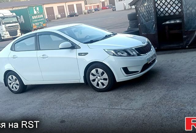 Білий Кіа Ріо, об'ємом двигуна 1.4 л та пробігом 81 тис. км за 8999 $, фото 1 на Automoto.ua