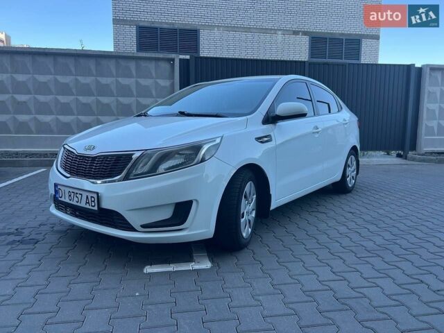 Білий Кіа Ріо, об'ємом двигуна 1.4 л та пробігом 171 тис. км за 6800 $, фото 1 на Automoto.ua
