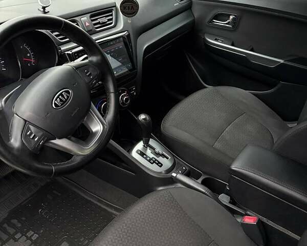 Білий Кіа Ріо, об'ємом двигуна 1.6 л та пробігом 91 тис. км за 8600 $, фото 2 на Automoto.ua