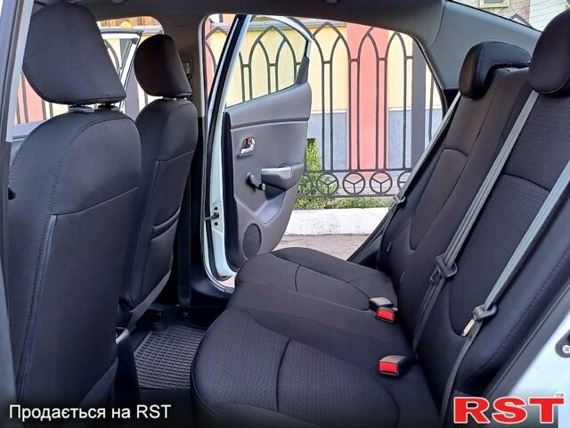 Білий Кіа Ріо, об'ємом двигуна 1.4 л та пробігом 52 тис. км за 8900 $, фото 6 на Automoto.ua