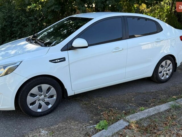 Белый Киа Рио, объемом двигателя 1.4 л и пробегом 129 тыс. км за 7500 $, фото 1 на Automoto.ua