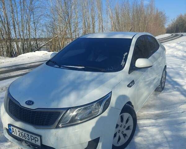 Білий Кіа Ріо, об'ємом двигуна 1.4 л та пробігом 266 тис. км за 6900 $, фото 2 на Automoto.ua