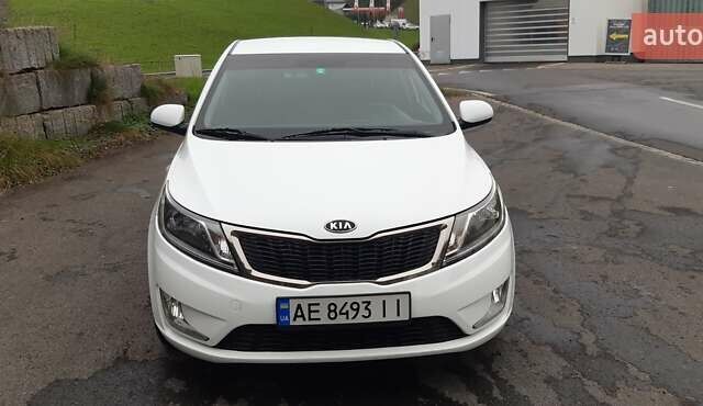 Белый Киа Рио, объемом двигателя 1.4 л и пробегом 175 тыс. км за 6900 $, фото 1 на Automoto.ua