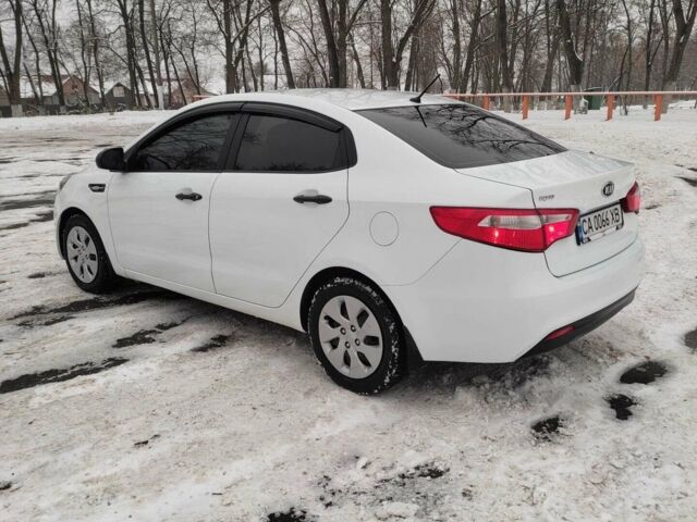 Білий Кіа Ріо, об'ємом двигуна 1.4 л та пробігом 98 тис. км за 8600 $, фото 4 на Automoto.ua