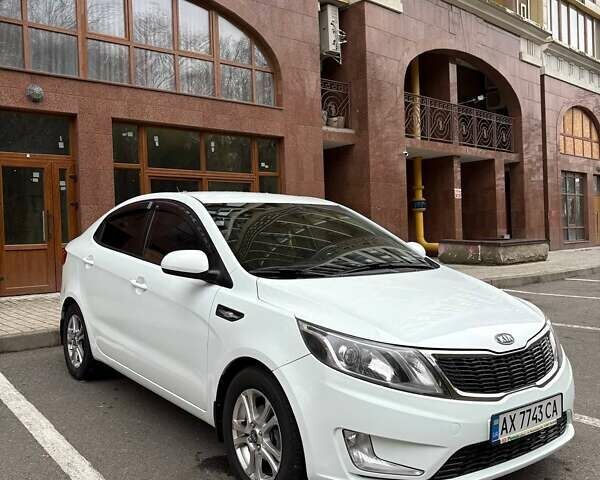 Білий Кіа Ріо, об'ємом двигуна 1.6 л та пробігом 91 тис. км за 8600 $, фото 7 на Automoto.ua