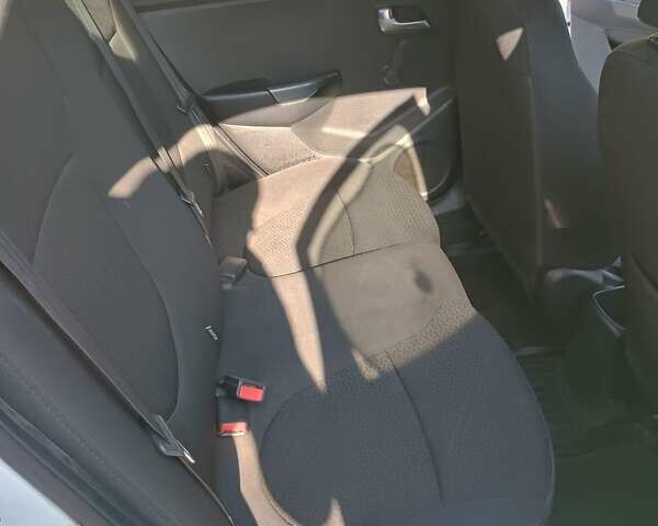Белый Киа Рио, объемом двигателя 1.4 л и пробегом 224 тыс. км за 7200 $, фото 4 на Automoto.ua
