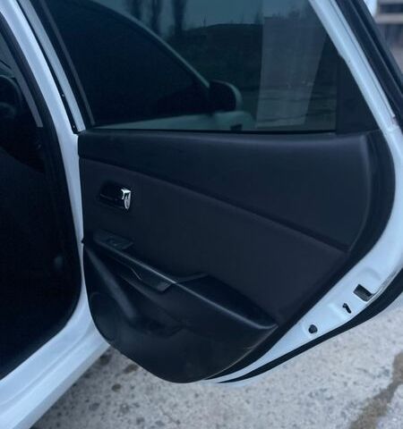 Білий Кіа Ріо, об'ємом двигуна 1.6 л та пробігом 163 тис. км за 5999 $, фото 18 на Automoto.ua