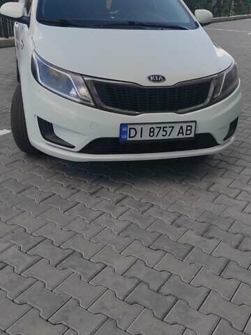Білий Кіа Ріо, об'ємом двигуна 1.4 л та пробігом 168 тис. км за 7800 $, фото 12 на Automoto.ua