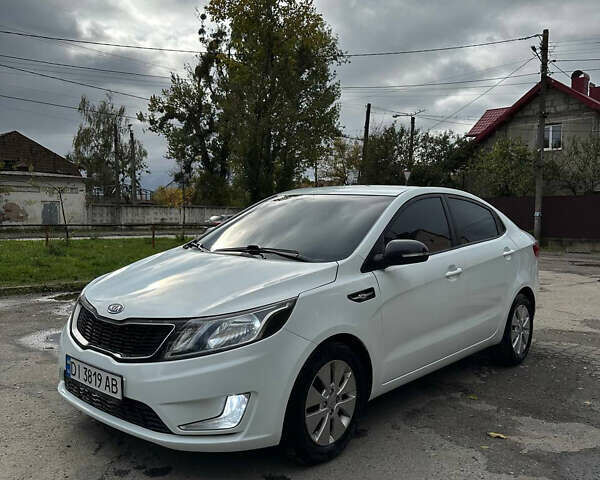 Белый Киа Рио, объемом двигателя 1.59 л и пробегом 149 тыс. км за 7800 $, фото 1 на Automoto.ua