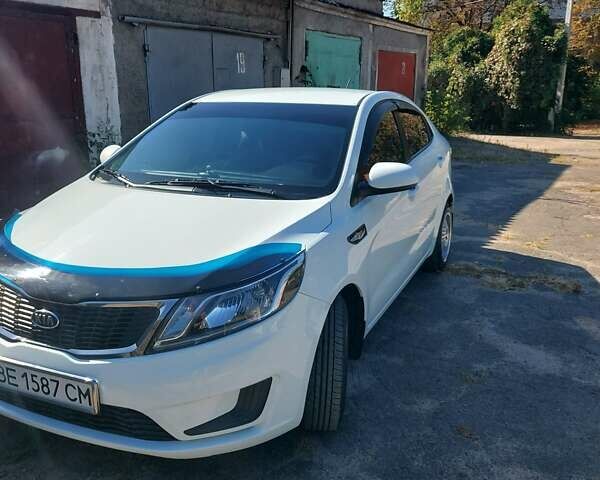 Білий Кіа Ріо, об'ємом двигуна 1.4 л та пробігом 69 тис. км за 8999 $, фото 3 на Automoto.ua
