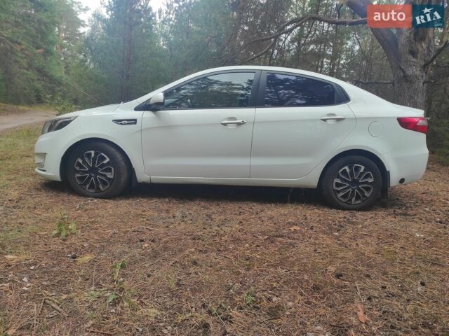 Белый Киа Рио, объемом двигателя 1.4 л и пробегом 253 тыс. км за 7050 $, фото 2 на Automoto.ua
