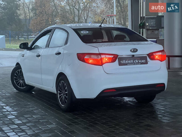 Белый Киа Рио, объемом двигателя 1.4 л и пробегом 150 тыс. км за 6499 $, фото 4 на Automoto.ua