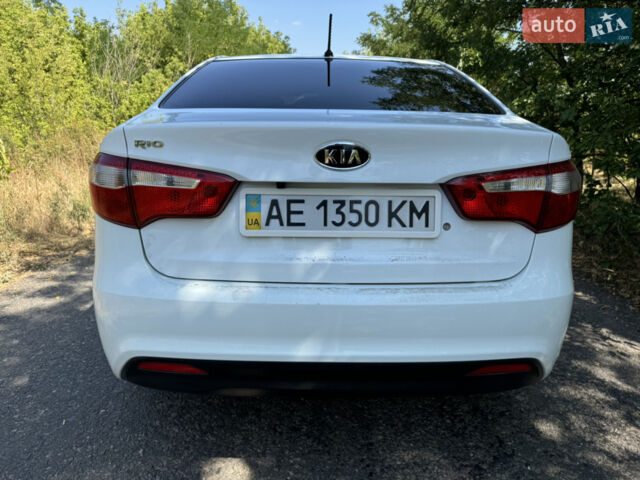 Білий Кіа Ріо, об'ємом двигуна 1.4 л та пробігом 96 тис. км за 8555 $, фото 10 на Automoto.ua