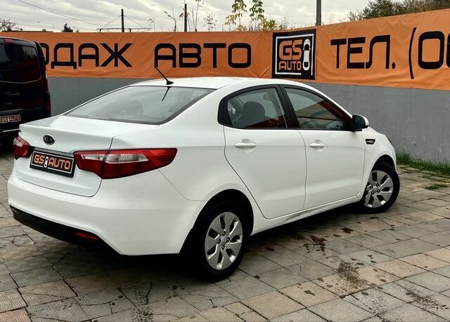 Білий Кіа Ріо, об'ємом двигуна 1.6 л та пробігом 123 тис. км за 8508 $, фото 10 на Automoto.ua