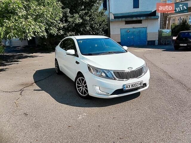 Білий Кіа Ріо, об'ємом двигуна 1.6 л та пробігом 202 тис. км за 6500 $, фото 11 на Automoto.ua