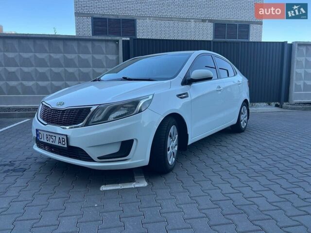 Білий Кіа Ріо, об'ємом двигуна 1.4 л та пробігом 171 тис. км за 6800 $, фото 2 на Automoto.ua