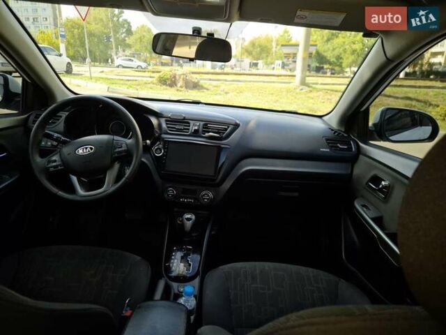Білий Кіа Ріо, об'ємом двигуна 1.6 л та пробігом 200 тис. км за 8000 $, фото 1 на Automoto.ua