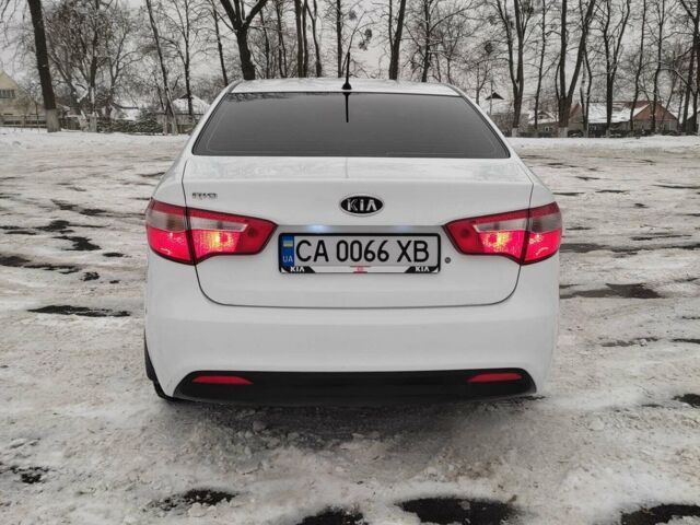 Білий Кіа Ріо, об'ємом двигуна 1.4 л та пробігом 98 тис. км за 8600 $, фото 2 на Automoto.ua