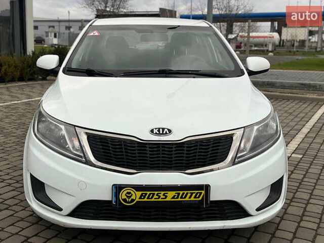 Белый Киа Рио, объемом двигателя 1.4 л и пробегом 200 тыс. км за 6900 $, фото 1 на Automoto.ua