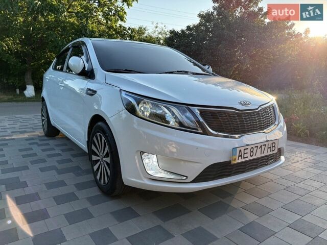 Белый Киа Рио, объемом двигателя 1.4 л и пробегом 173 тыс. км за 7000 $, фото 2 на Automoto.ua