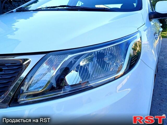 Білий Кіа Ріо, об'ємом двигуна 1.4 л та пробігом 52 тис. км за 8900 $, фото 13 на Automoto.ua