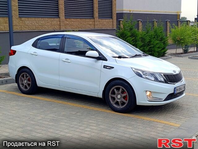 Білий Кіа Ріо, об'ємом двигуна 1.4 л та пробігом 99 тис. км за 6500 $, фото 3 на Automoto.ua