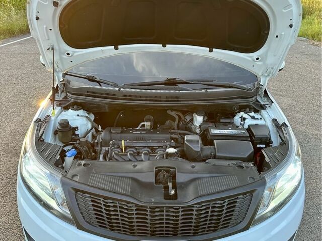 Білий Кіа Ріо, об'ємом двигуна 1.4 л та пробігом 142 тис. км за 6000 $, фото 22 на Automoto.ua