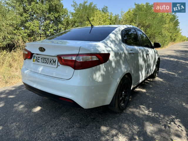 Білий Кіа Ріо, об'ємом двигуна 1.4 л та пробігом 96 тис. км за 8555 $, фото 11 на Automoto.ua
