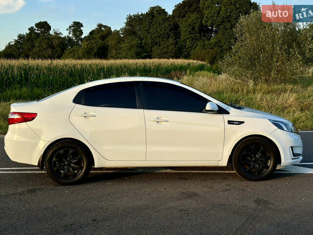 Білий Кіа Ріо, об'ємом двигуна 1.4 л та пробігом 142 тис. км за 6200 $, фото 18 на Automoto.ua