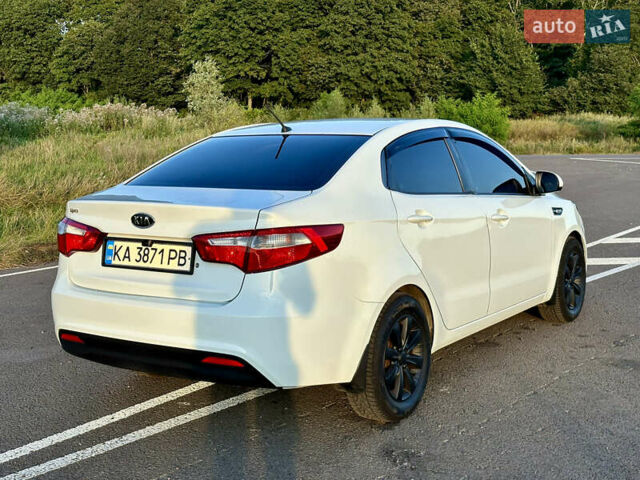 Білий Кіа Ріо, об'ємом двигуна 1.4 л та пробігом 142 тис. км за 6200 $, фото 16 на Automoto.ua
