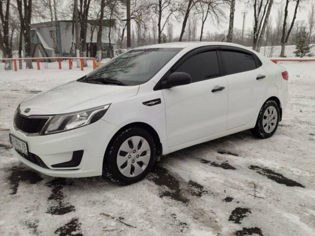 Білий Кіа Ріо, об'ємом двигуна 1.4 л та пробігом 98 тис. км за 8600 $, фото 1 на Automoto.ua