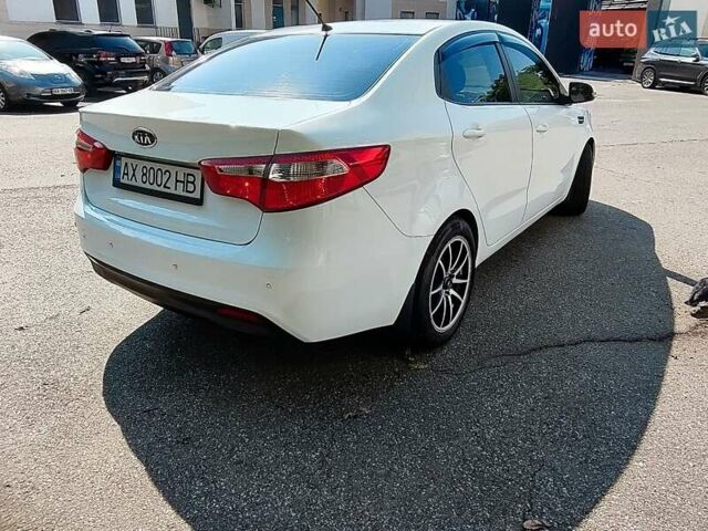 Білий Кіа Ріо, об'ємом двигуна 1.6 л та пробігом 202 тис. км за 6500 $, фото 10 на Automoto.ua