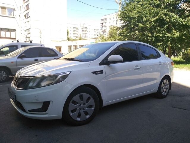 Білий Кіа Ріо, об'ємом двигуна 1.4 л та пробігом 148 тис. км за 8700 $, фото 5 на Automoto.ua