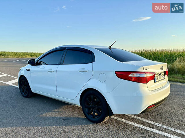 Білий Кіа Ріо, об'ємом двигуна 1.4 л та пробігом 142 тис. км за 6200 $, фото 11 на Automoto.ua